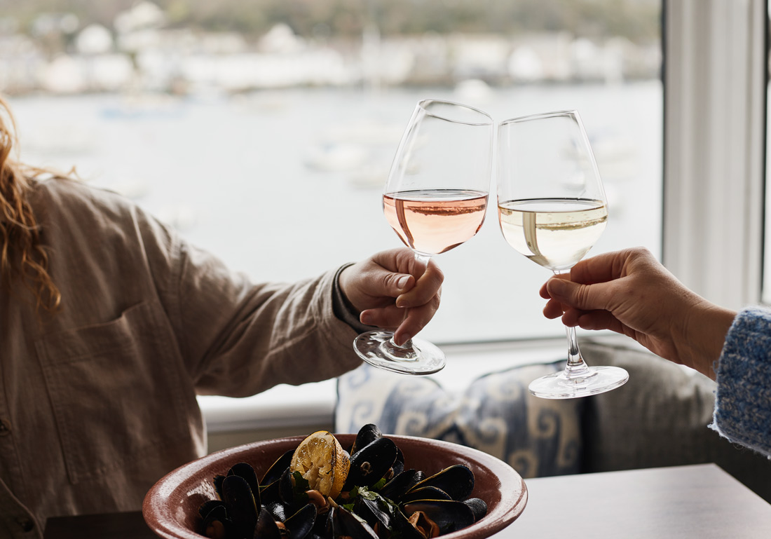 people dining at Water's Edge Restaurant at The Greenbank Hotel in Falmouth